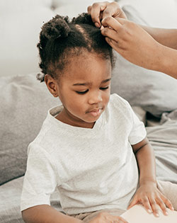 BRUSHING BABY’S HAIR